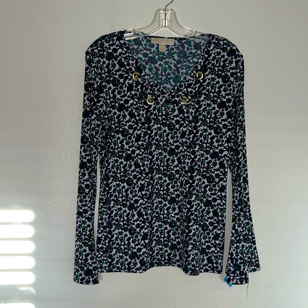 Michael Kors navy/ green / white floral blouse . It has bell sleeves .size med